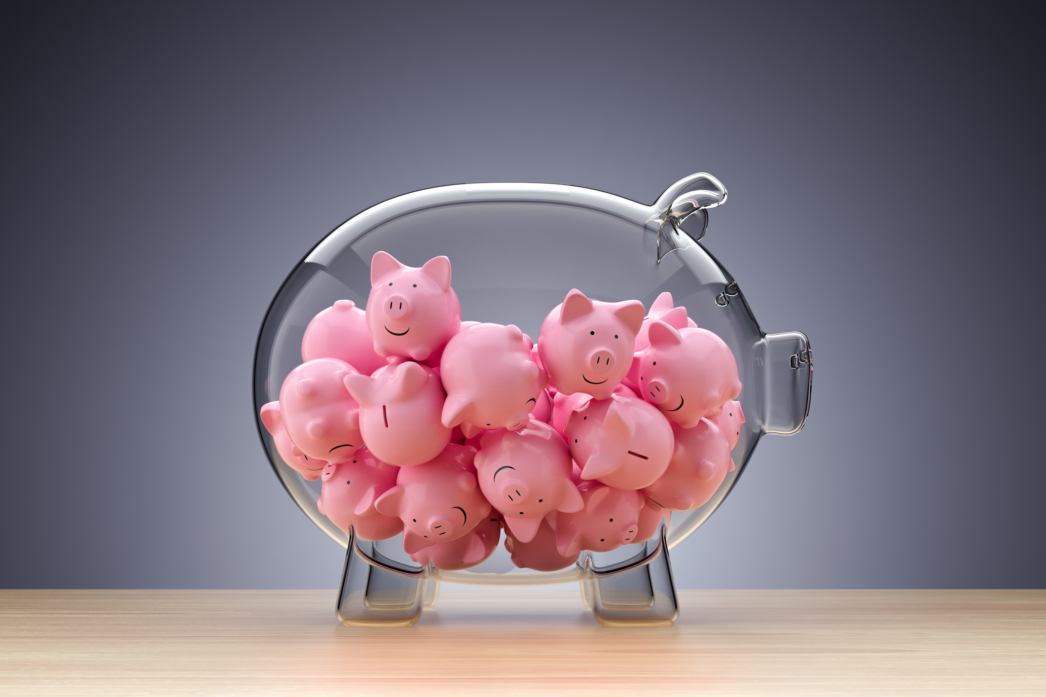 Glassparschwein voller kleiner rosa Schweinchen
