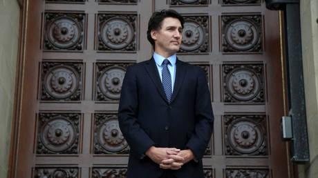 „Verschwoerungstheoretiker bedrohen die Mainstream Medien sagt der kanadische Premierminister – World