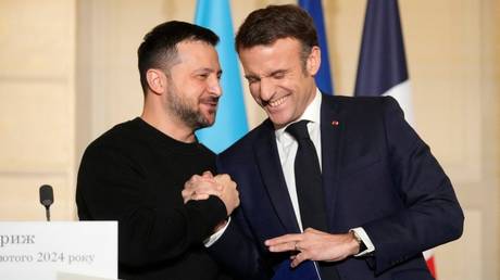 Macron kaempft darum Geld fuer die Ukraine zu rechtfertigen –