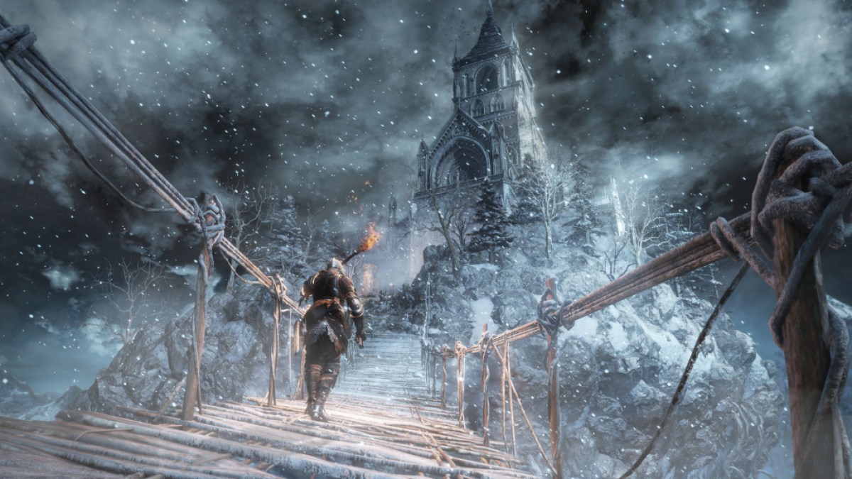 der Spieler geht über eine verschneite Brücke zu einem Turm