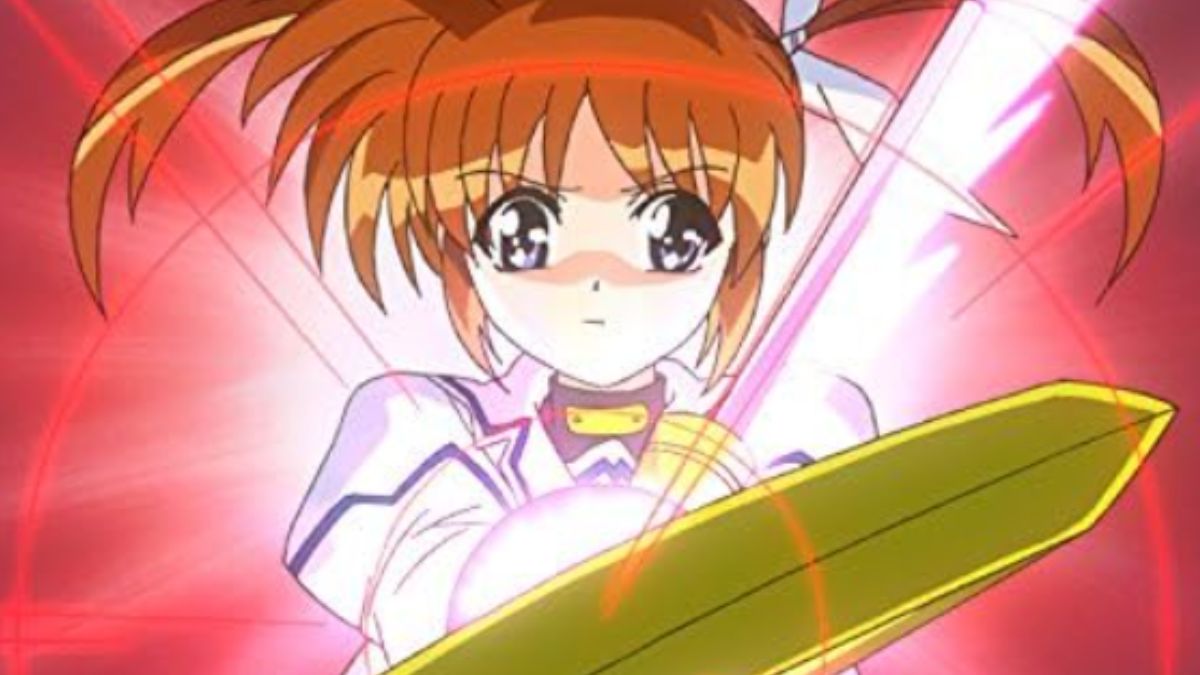 Screenshot aus dem Anime Magical Girl Lyrical Nanoha, der die Hauptfigur mit ihrem Zauberstab zeigt