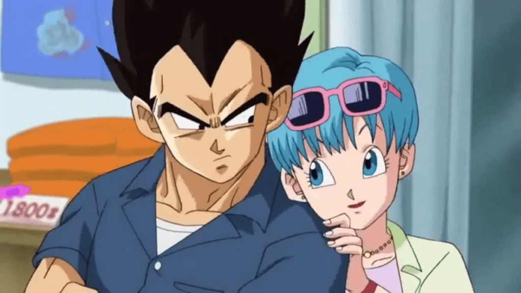 Bulma umarmt Vegeta von hinten im Rahmen eines Artikels über die 10 großartigsten Anime-Paare aller Zeiten.