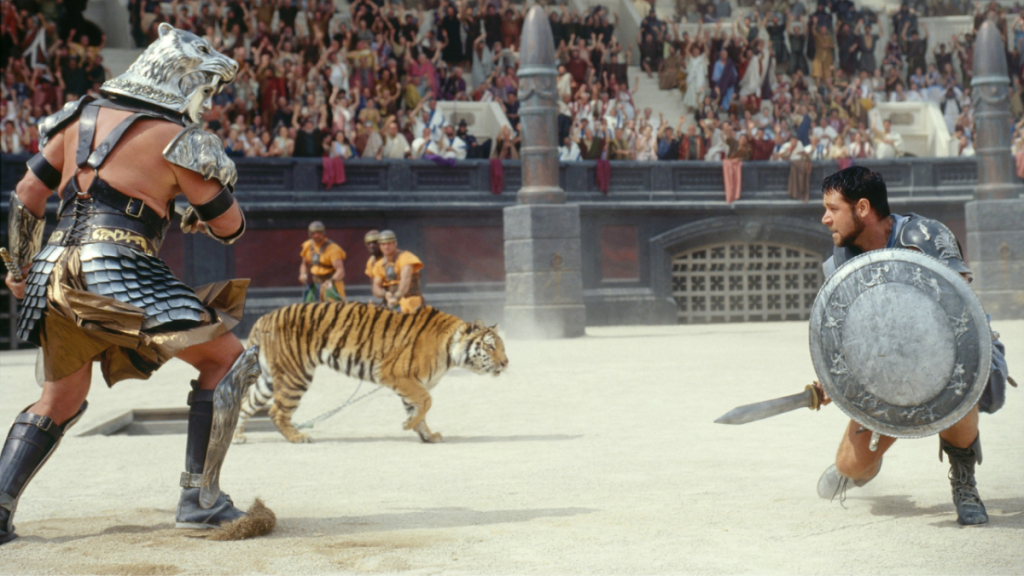 Russel Crowe tritt in Gladiator in der Arena gegen einen Champion und einen Löwen an