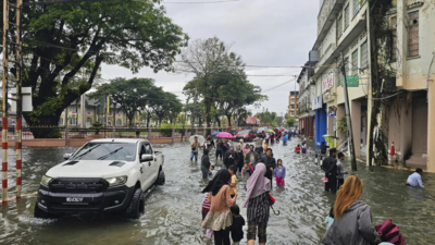 Ueberschwemmungen in Malaysia 4 Tote ueber 80000 Vertriebene waehrend sich