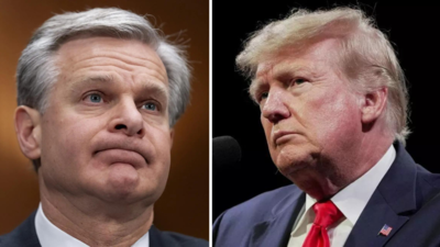 Wie jahrelange Fehden mit Trump FBI Direktor Christopher Wray zum Ruecktritt