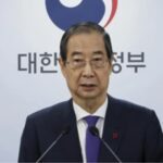 Suedkorea hebt die Amtsenthebung von PM Han Duck Soo auf und