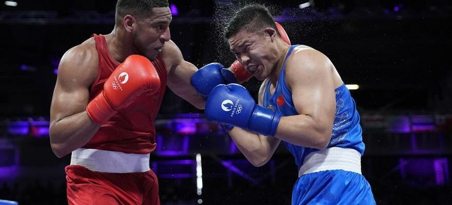 Jeux Olympiques Le boxeur Emnanuel Reyes resiste a la