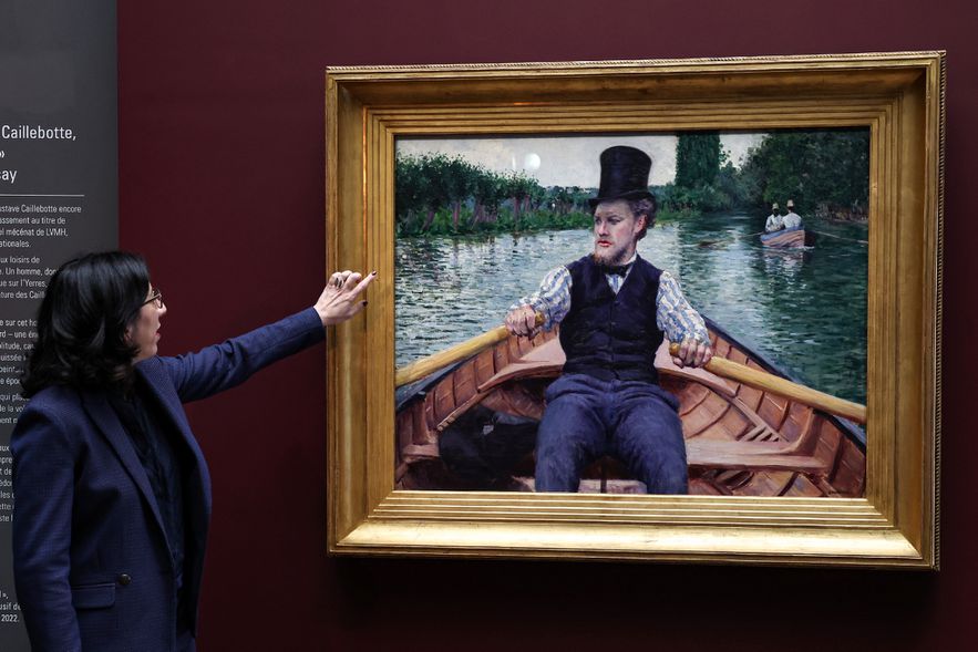 Culture Minister Rima Abdul-Malak in front of the painting "The Boat Party" by Gustave Caillebotte when he entered the Musée d'Orsay on January 30, 2023 in Paris