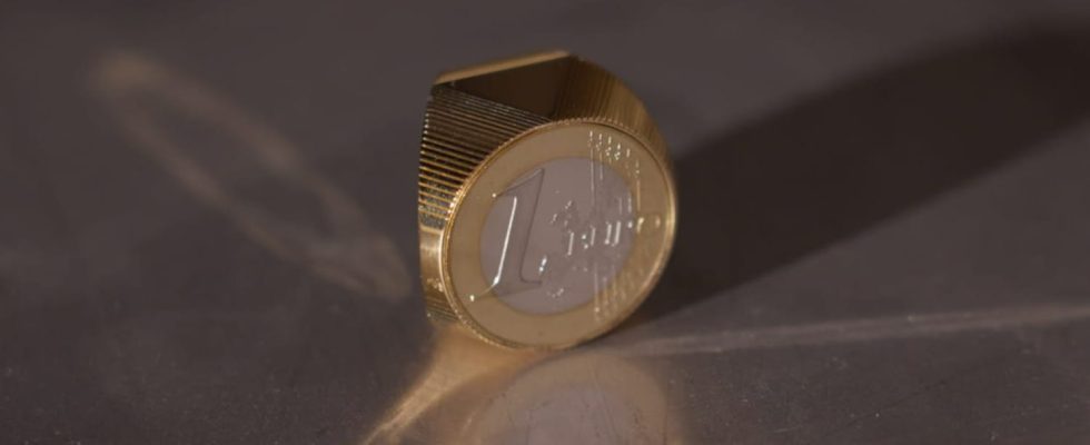 Belgium unveils its first three sided euro coin Heads tails and