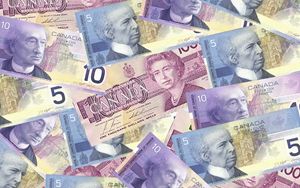 Canadas central bank cuts interest rates to 5