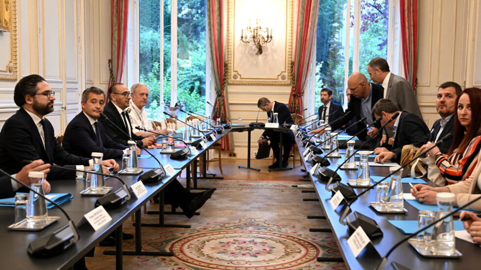 French Interior Minister Gérald Darmanin (2ᵉ g), Paris Police Prefect Laurent Nunez (3ᵉ g) and National Police Director General Frédéric Veaux (4ᵉ g) attend a meeting with police unions, at the Beauvau hotel, in Paris, on July 27, 2023.