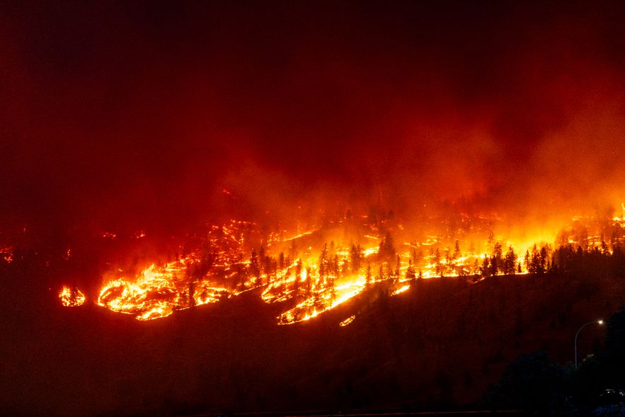 Flames rage through the hills of West Kelowna in British Columbia, Canada, August 17, 2023