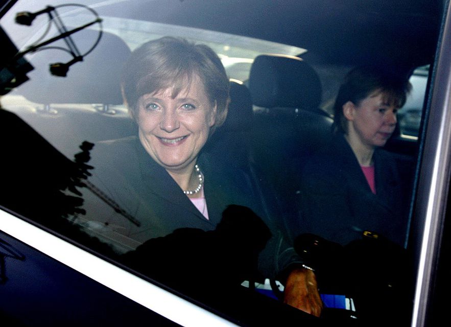 Former German Chancellor Angela Merkel and her adviser Beate Baumann, October 10, 2005 in Berlin