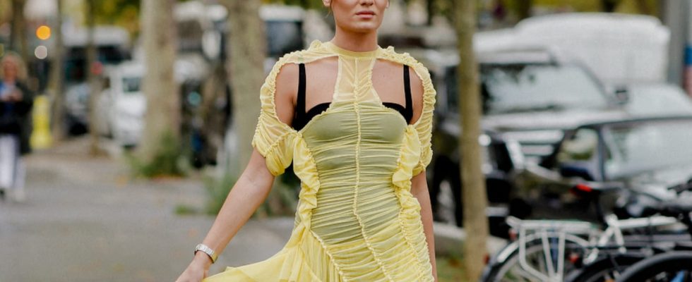 This impossible to wear frilly dress is the absolute star