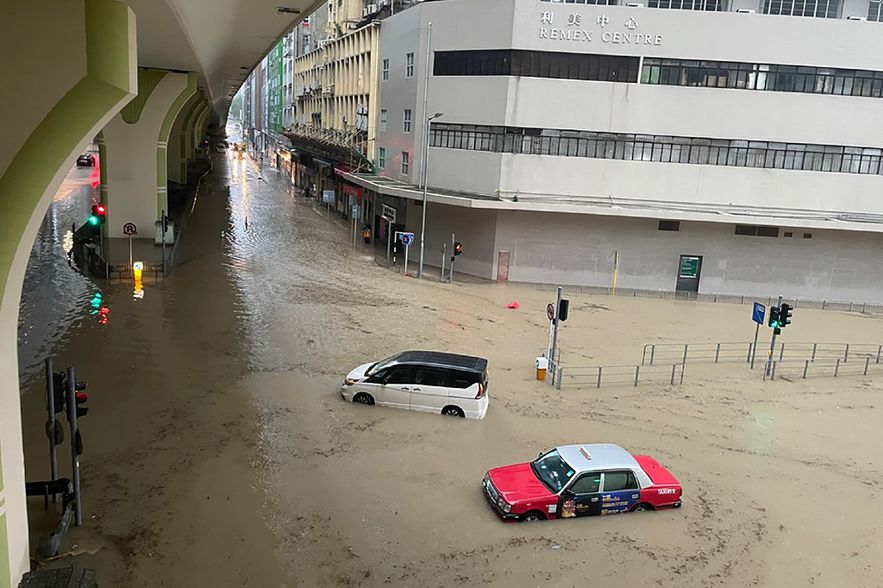 Vehicles stranded on a flooded road in Hong Kong, September 8, 2023