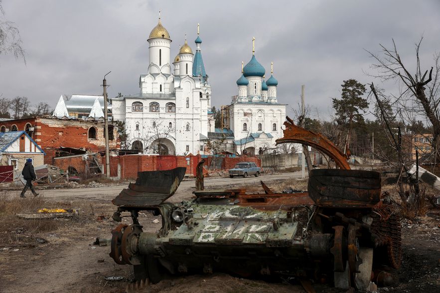 A destroyed Russian tank in front of a damaged church in Svyatogirsk, Donetsk region, March 1, 2023