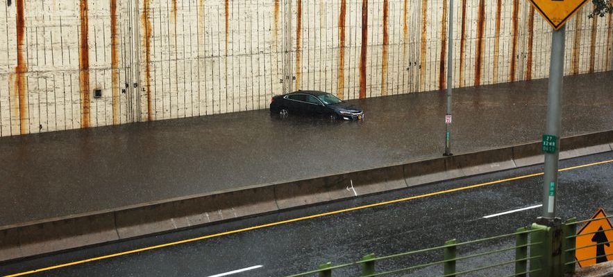 New York paralyzed by torrential rains from Tropical Storm Ophelia