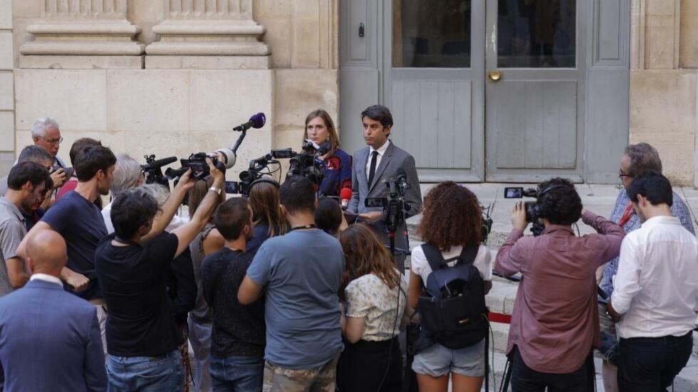 French Minister of Education and Youth, Gabriel Attal (right) Minister of Education and Youth accompanied by Carole Grandjean, Minister of Education and Vocational Training during a press conference at the in Paris on September 6, 2023, the day after the suicide of a teenager at a high school in Poissy.  (Illustrative image)