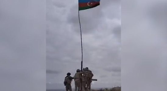 The Azerbaijani flag is flying in the regions taken from