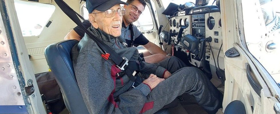 Veteran 99 year old all smiles after flight with fellow pilot