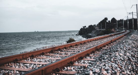 What are the stones placed on the railway tracks used