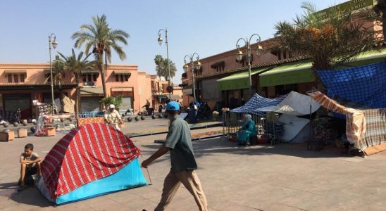 in a district of Marrakech many families continue to sleep