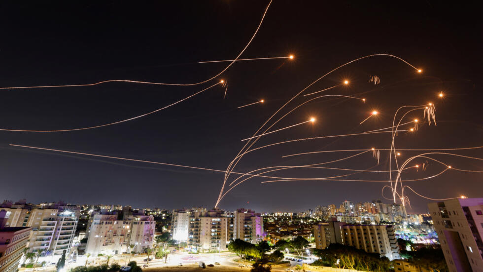 The Israeli Iron Dome anti-missile system intercepts rockets launched from the Gaza Strip, seen from the city of Ashkelon, Israel, October 8, 2023. 