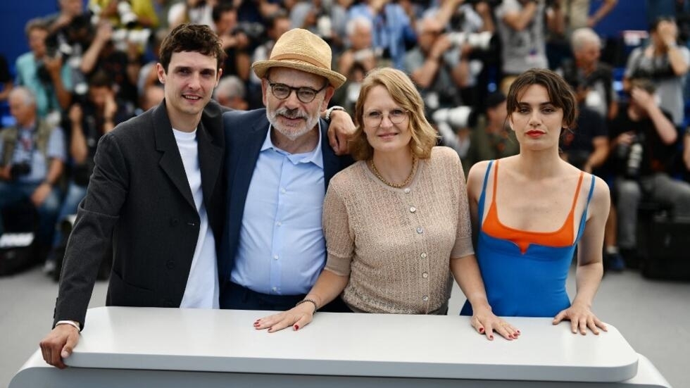 From left to right: actors Julien Frison, Jean-Pierre Darroussin, director Anna Novion and actress Ella Rumpf pose for the film “Le Théorème de Marguerite” during the 76th edition of the Cannes Film Festival in Cannes, south of the France, May 23, 2023.