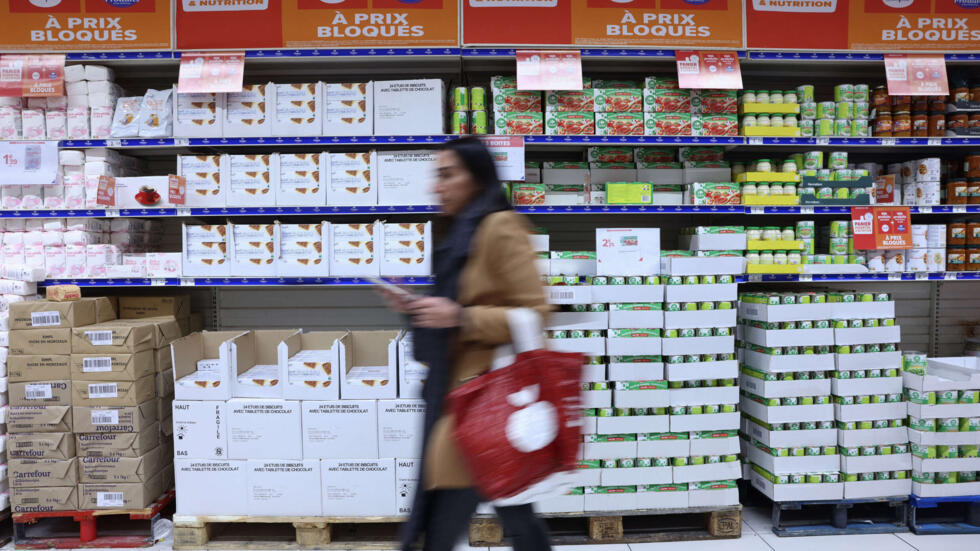 A customer passes through a Carrefour hypermarket in Villeneuve-la-Garenne, March 29, 2023. (illustrative image)