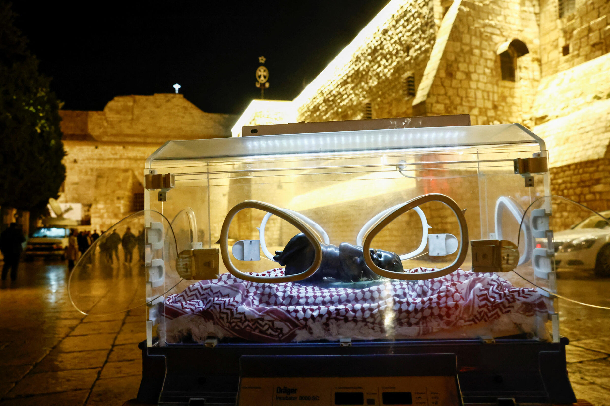 A depiction of Jesus in an incubator was installed in front of the Church of the Nativity in Bethlehem on December 24.