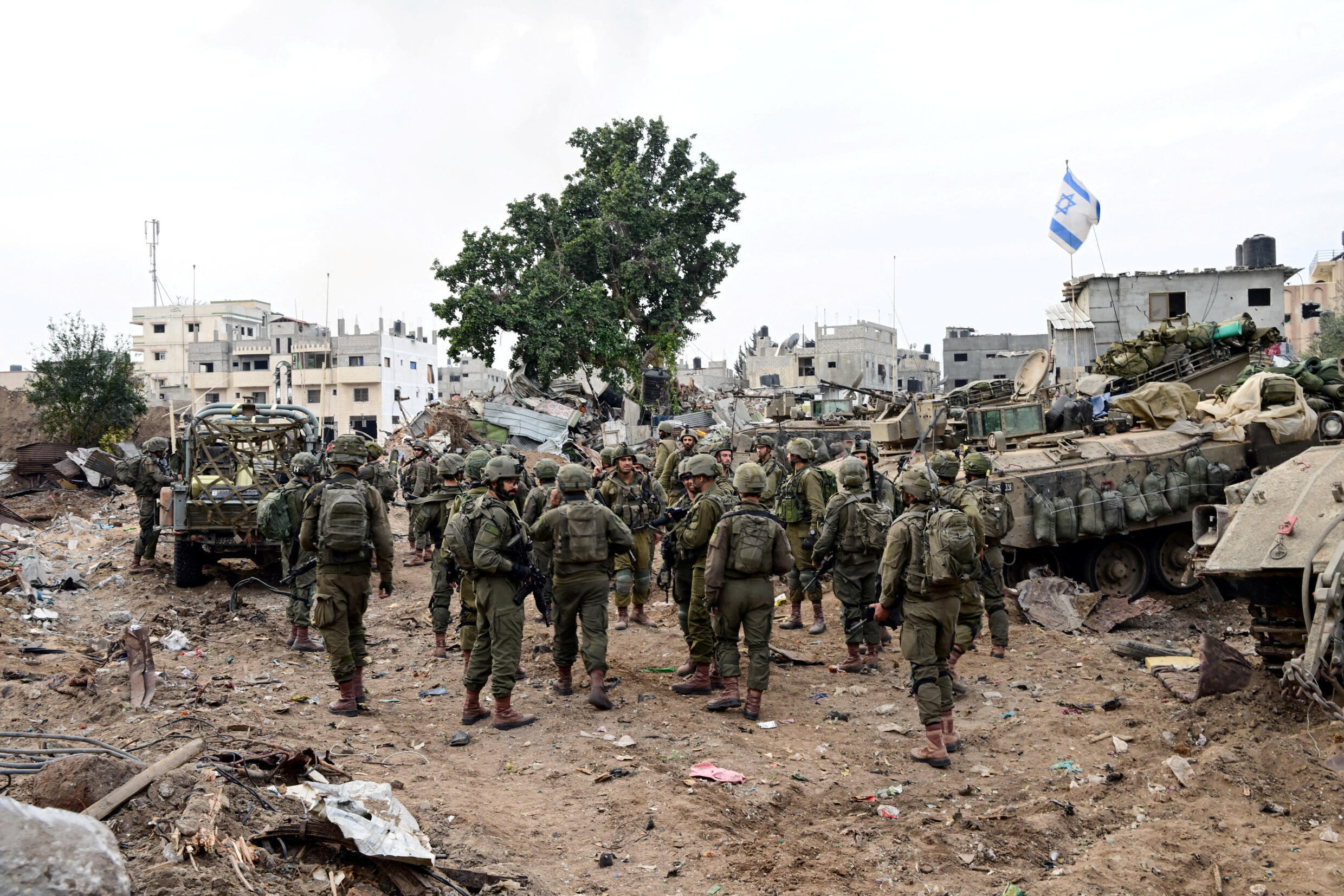 Israeli soldiers operate in the Shajaiya district of Gaza City in the Gaza Strip, December 8, 2023.