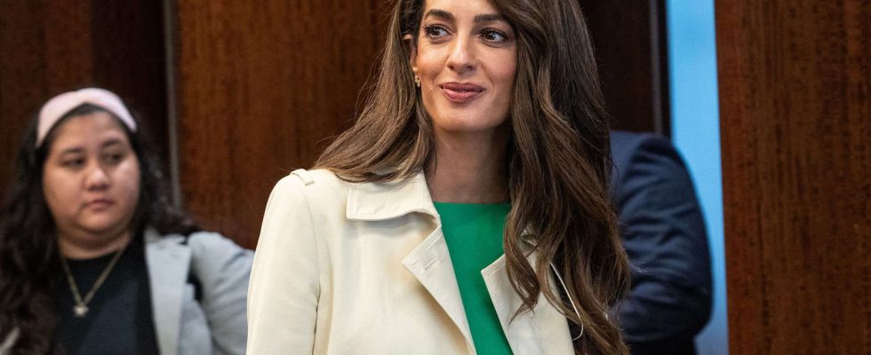 Even in the pouring rain Amal Clooney remains the most