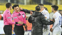 The club manager punched the referee in the head