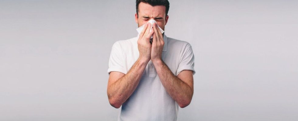 While holding back from sneezing a man tears his windpipe