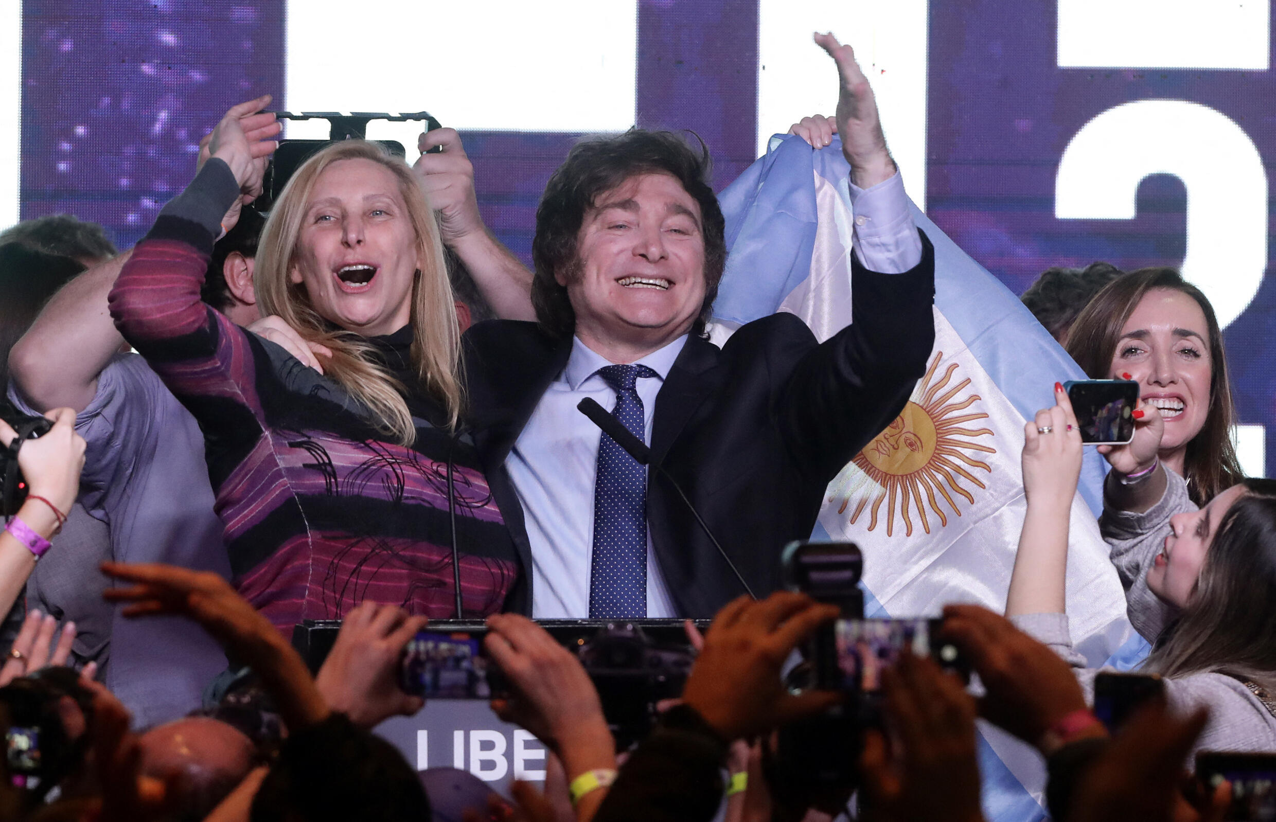 Argentine presidential candidate Javier Milei celebrates the results of the primaries with his sister Karina Milei, in Buenos Aires on August 13, 2023.