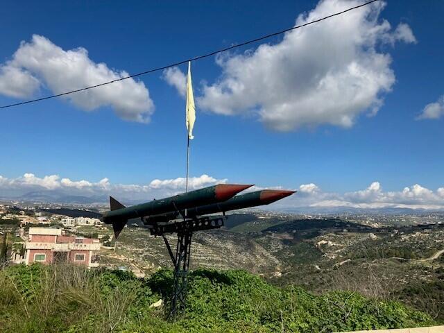 Dummy rockets are topped with the Hezbollah flag, in southern Lebanon.