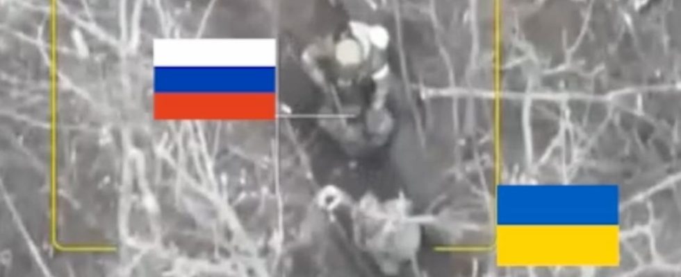 Russia shoots prisoners of war in a trench