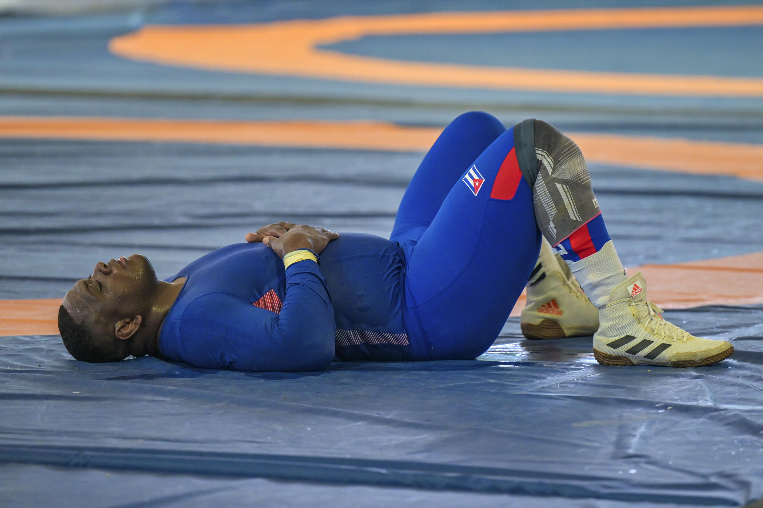 Mijain Lopez recovers after an intensive training session in Havana, as part of his preparation for Paris-2024, where he will aim for a fifth gold medal.