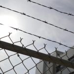 prison guards arrested for assault on minors