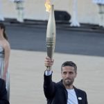 the Olympic flame officially handed over to the French Organizing