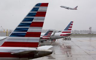 American Airlines cuts its second quarter profit forecast