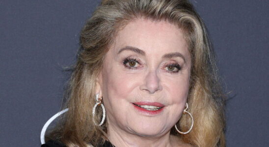 At 80 Catherine Deneuve walks the Cannes red carpet with