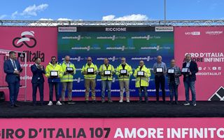 Emilia Romagna flood at the Giro dItalia Aspi and Police
