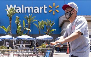 Wal Mart celebrates quarterly results above