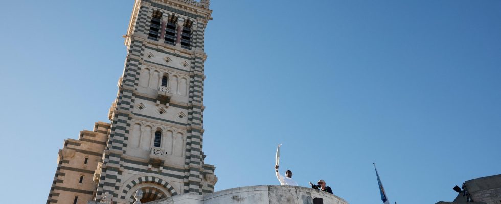 the Olympic flame tours Marseille before leaving for Paris