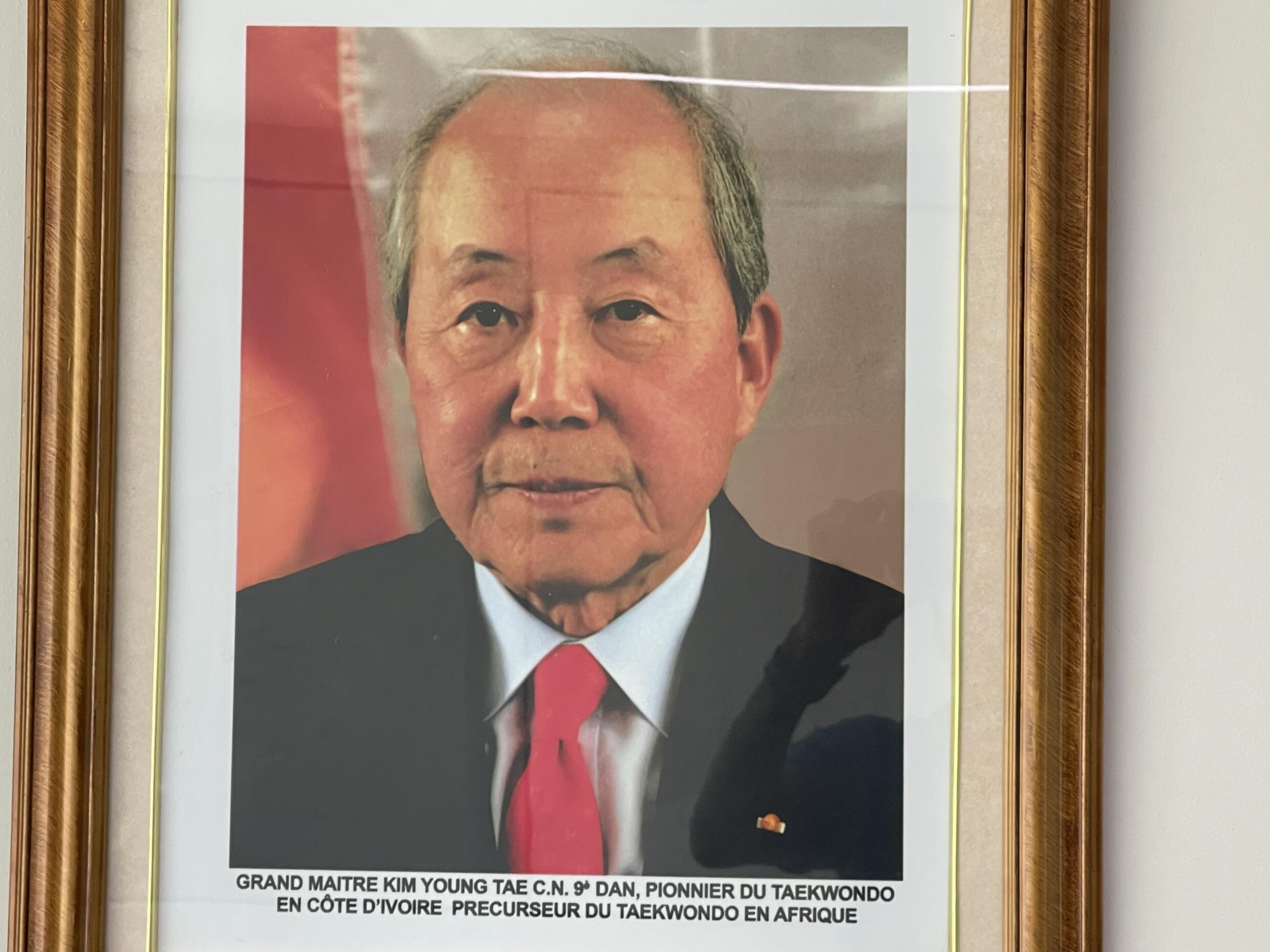 Portrait of Korean Kim Young Tae on the walls of the Ivorian Sports and Cultural Center, gift from South Korea.