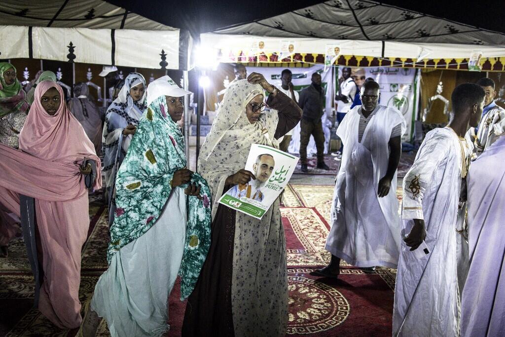 Supporters of the opposition Tawassoul party gather under a tent in Nouakchott on June 24, 2024.