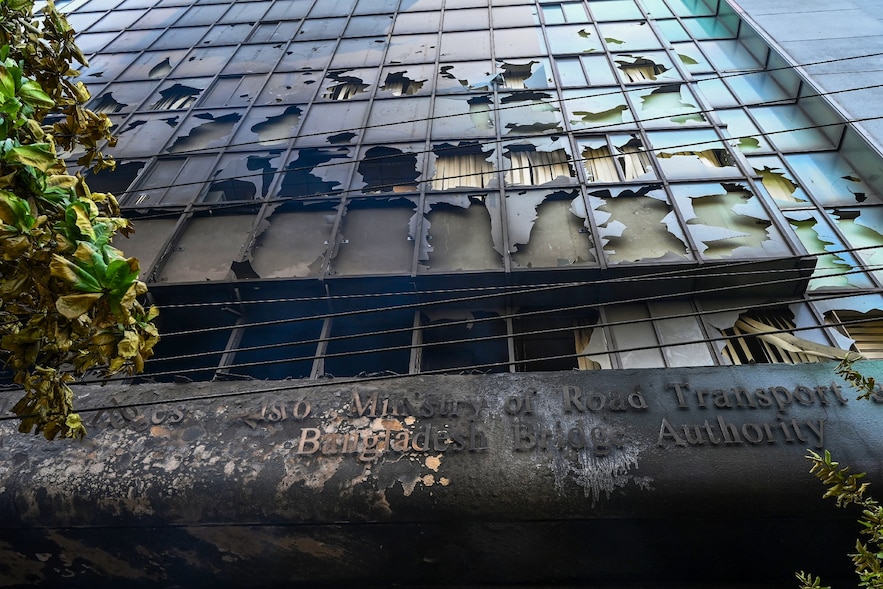 A building set on fire by students opposing quotas in the civil service, on July 19, 2024 in Dhaka, Bangladesh
