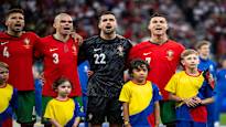 Cristiano Ronaldo threw high fives with Finnish children behind the