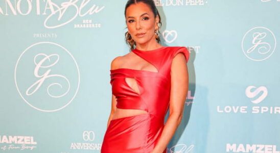 Eva Longoria in a daringly cut out red dress Charlene of